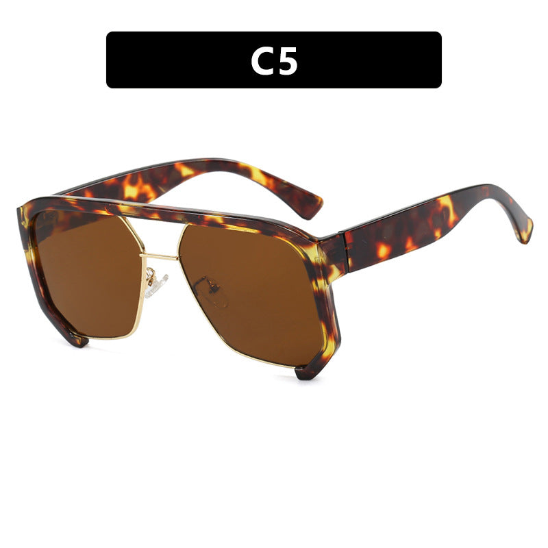 Ladies fashionable oversized sunglasses with elegant, faceted frame construction Stornfield