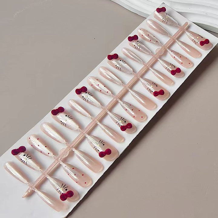 Artificial nails with playful Hello Kitty design Stornfield