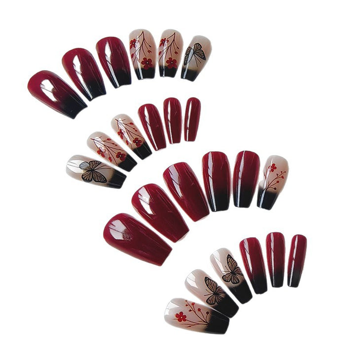 Artificial nails with butterfly and flower motifs Stornfield