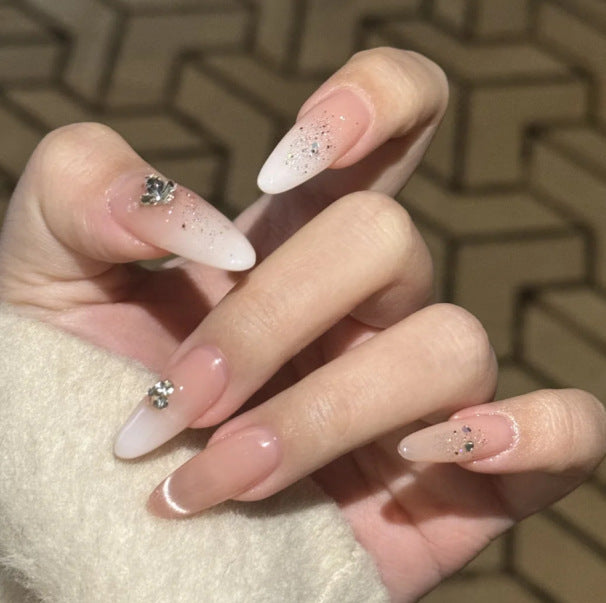 Artistic Long Stiletto Press-On Nails with Floral and Gemstone Accents Stornfield