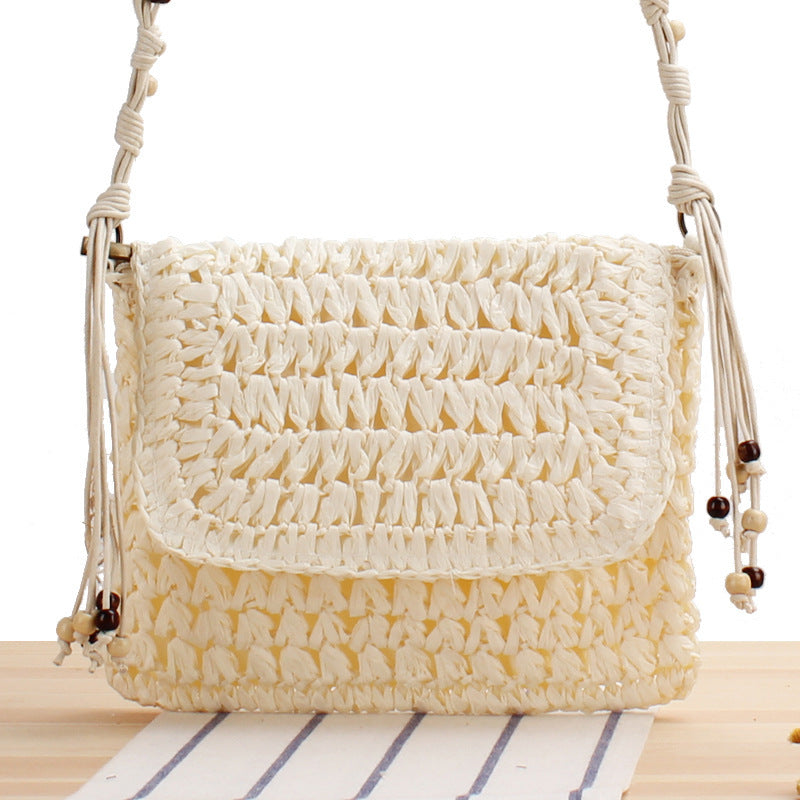 Braided Natural Material Handbag with Playful Fringes Stornfield
