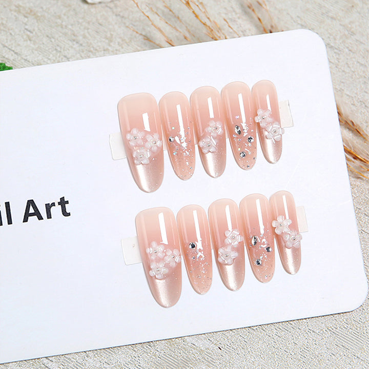 Nail art set with floral 3D applications and glitter accents Stornfield