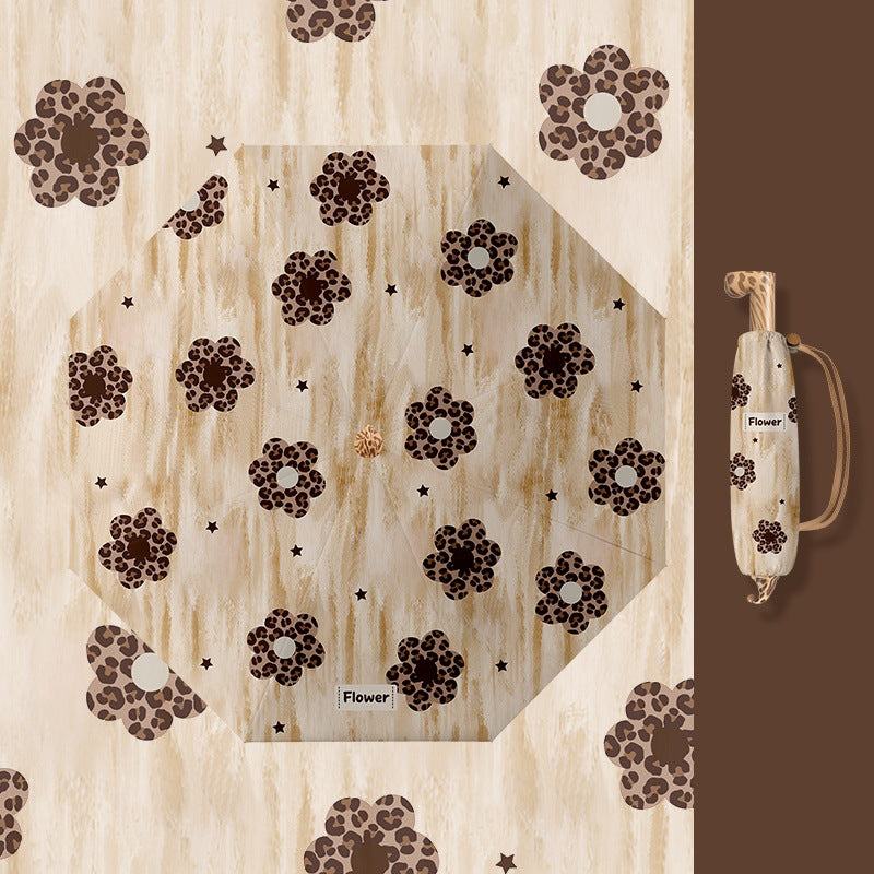 Ladies folding umbrella with playful design Stornfield