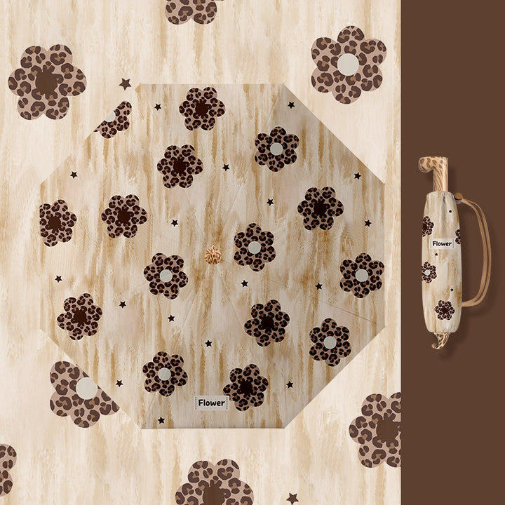 Ladies folding umbrella with playful design Stornfield