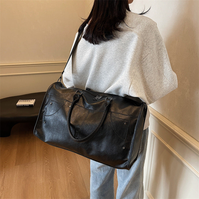 Elegant leather bag with stylish design and versatile carrying options Stornfield