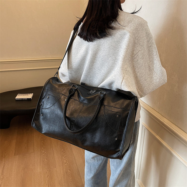 Elegant leather bag with stylish design and versatile carrying options Stornfield