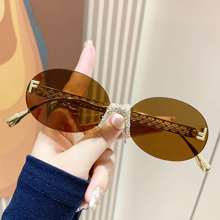Women's sunglasses with glittering frame and oval lenses Stornfield