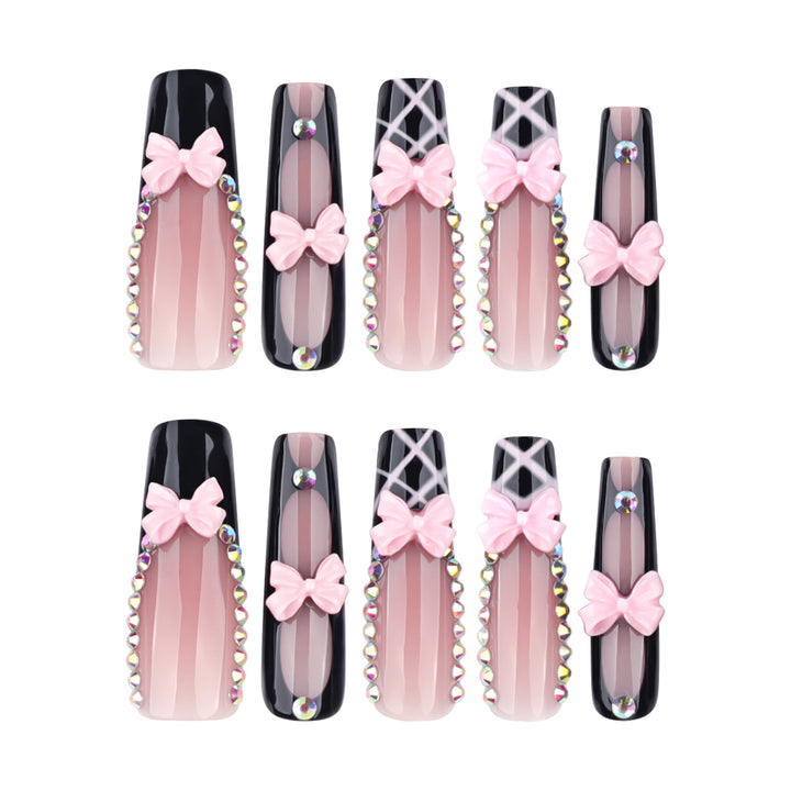 Artistic acrylic nails with floral design and rhinestone bow Stornfield