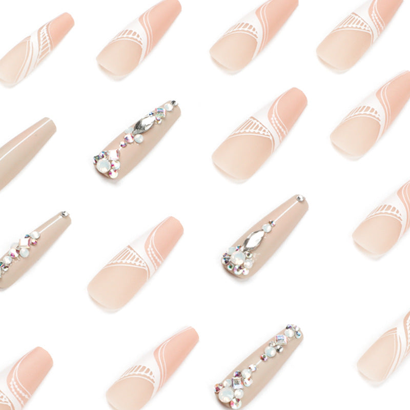 Artful nail extensions with elegant decorations Stornfield