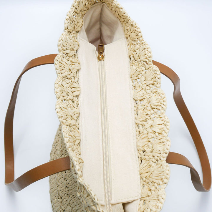Beach bag with handcrafted crochet pattern and leather handles Stornfield