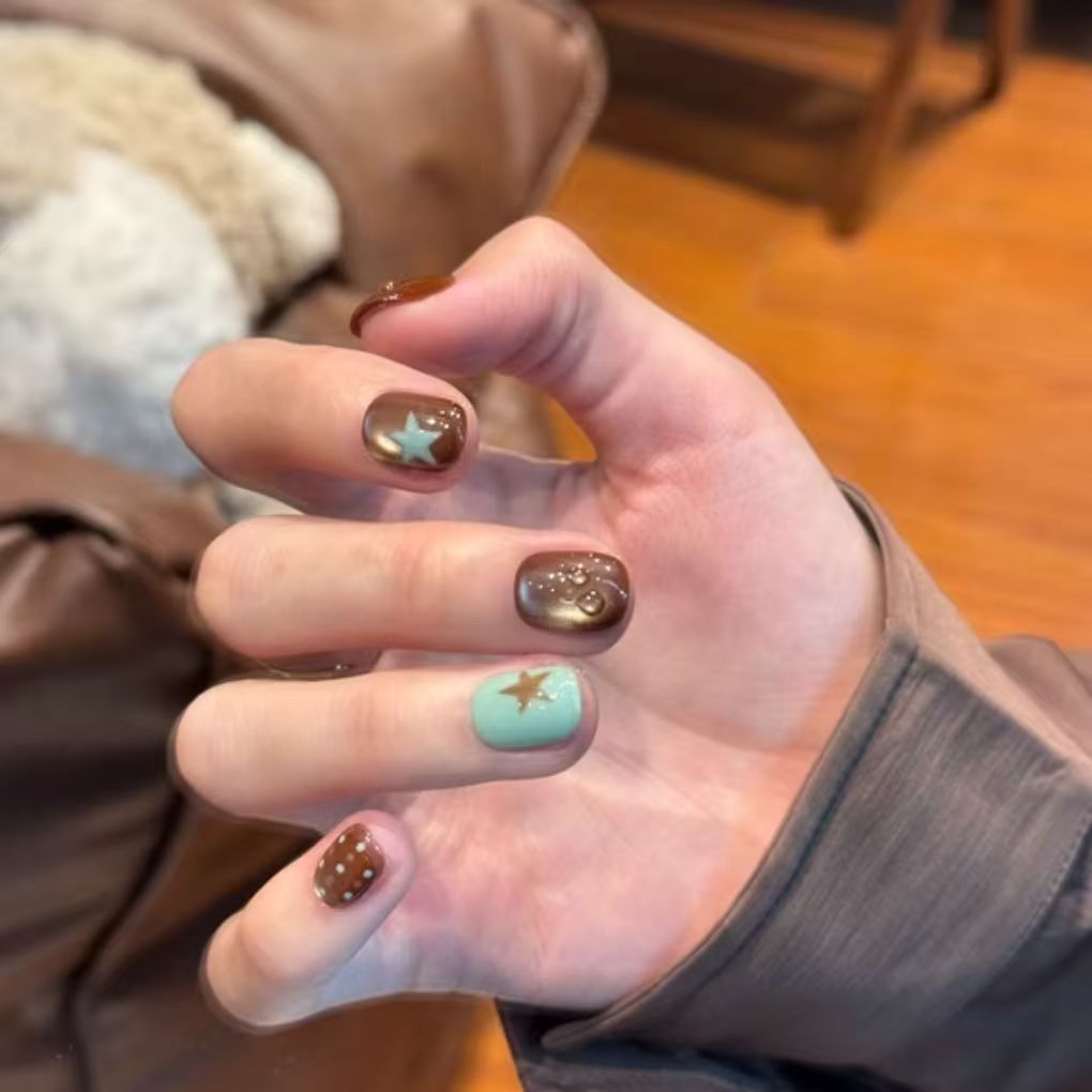 Artistic Press-On Nail Set with Star Designs