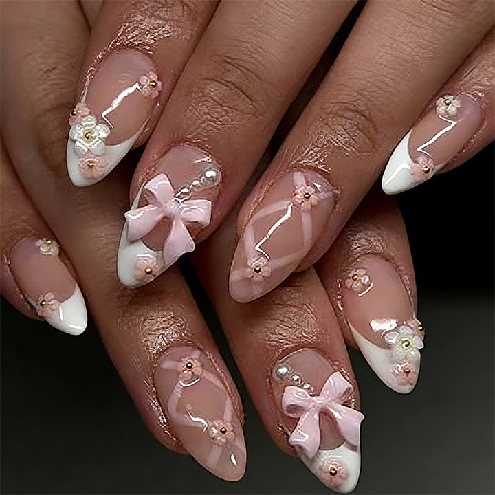 Artful Nail Tips with Ribbons and Floral Decorations Stornfield