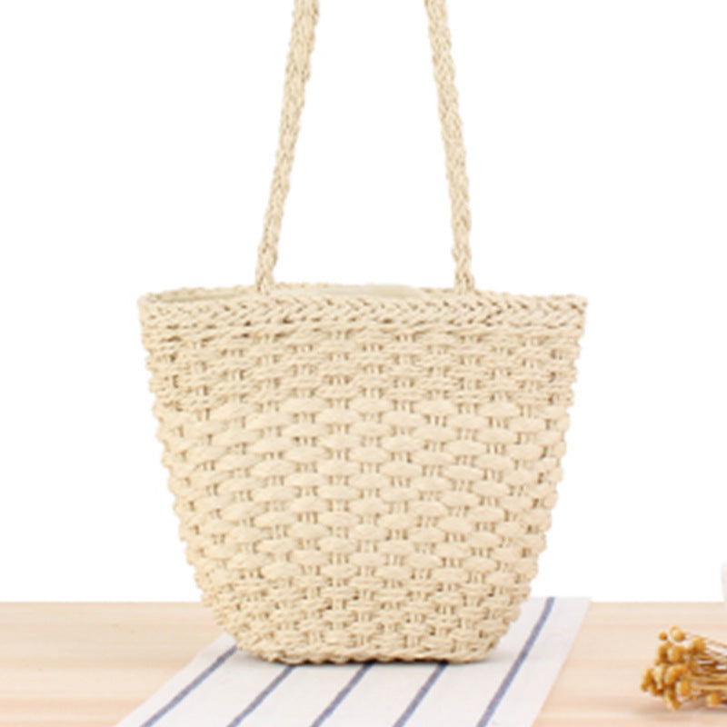 Braided handbag made of natural raffia with robust carrying straps Stornfield