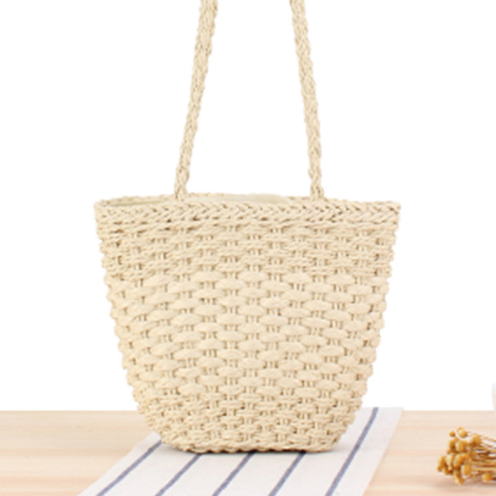 Braided handbag made of natural raffia with robust carrying straps Stornfield
