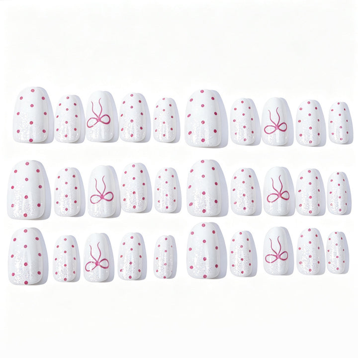 Artificial nail set with delicate dots and bow pattern Stornfield