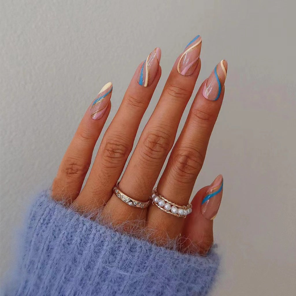 Artistic nail art with metallic accents and abstract designs Stornfield