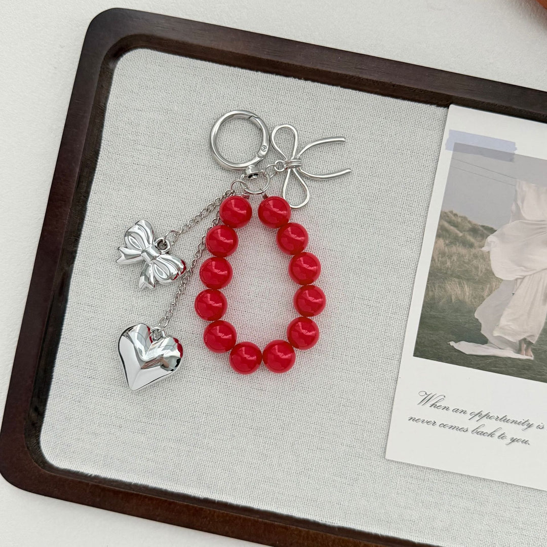 Elegant Heart and Bow Charm Keychain Stornfield