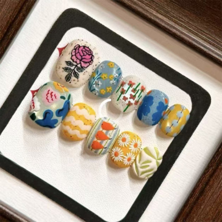 Artistic Floral and Nature-Inspired Nail Design Set Stornfield