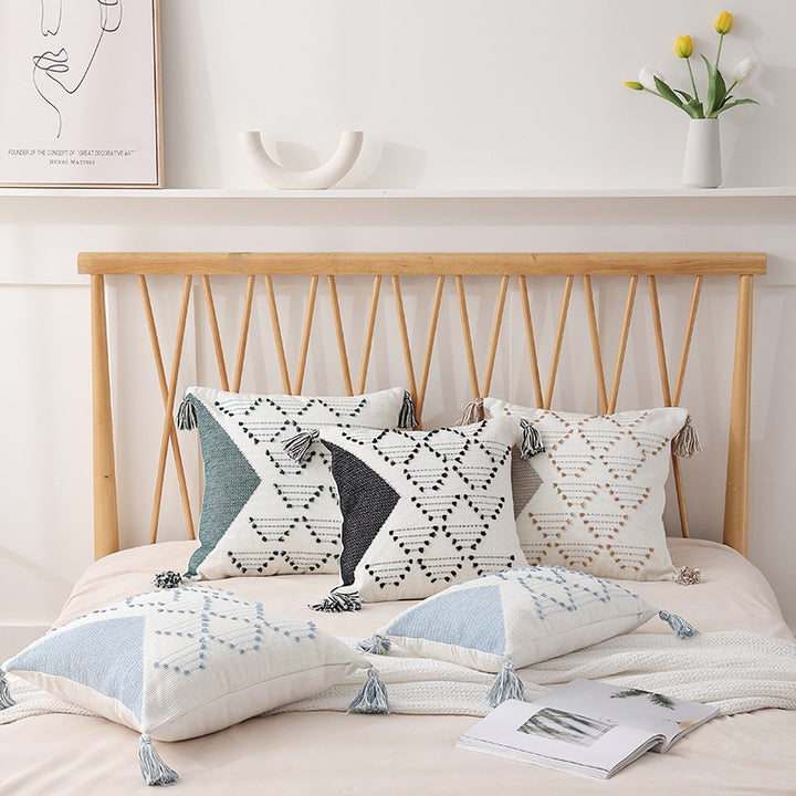 Woven decorative cushion cover with geometric tuft pattern, tassels and concealed zipper
