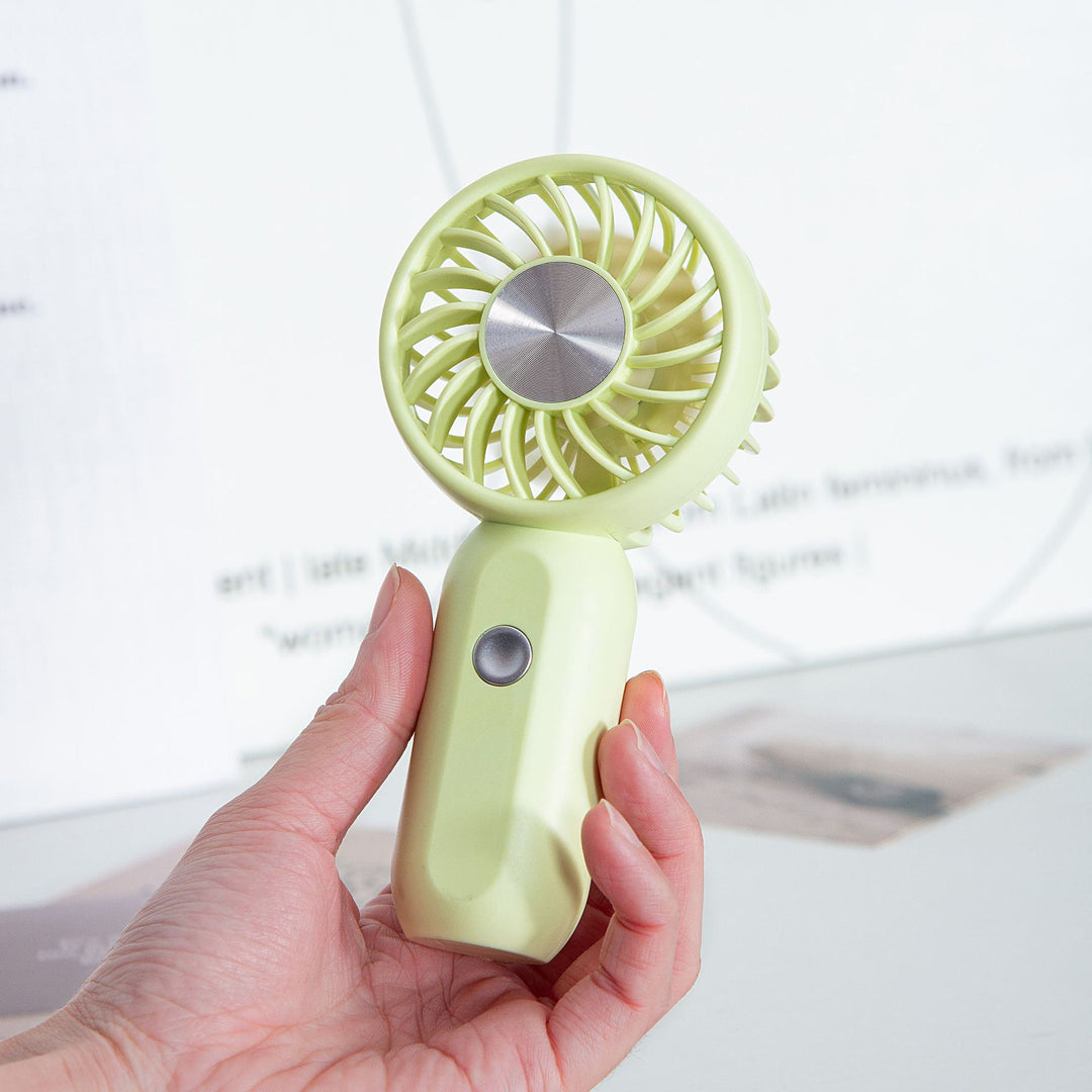 Women's portable mini fan with ergonomic grip technology Stornfield