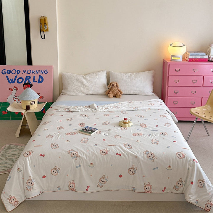 Quilted children's comforter with cute animal print and light microfiber filling