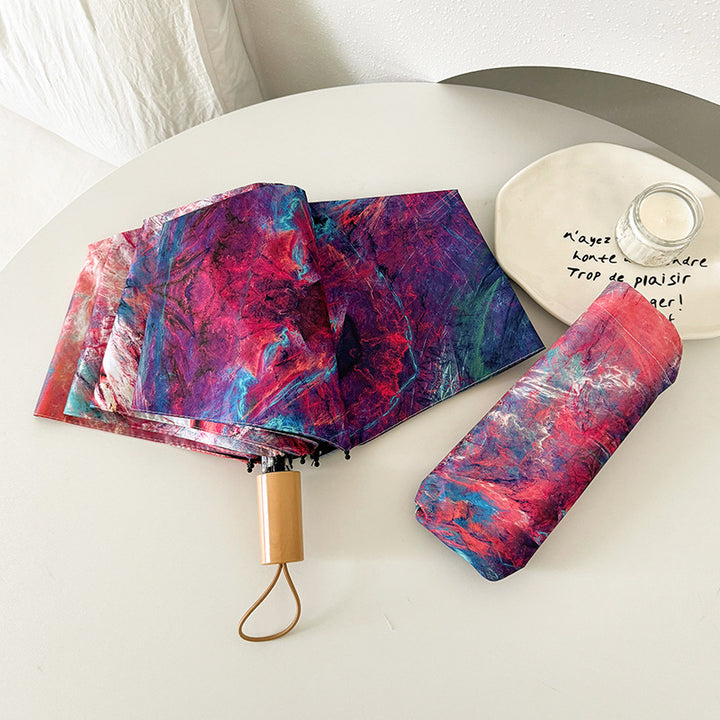Ladies elegant folding umbrella with unique marble pattern Stornfield