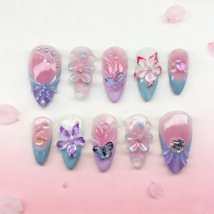 Artificial nail set with floral and glitter details Stornfield