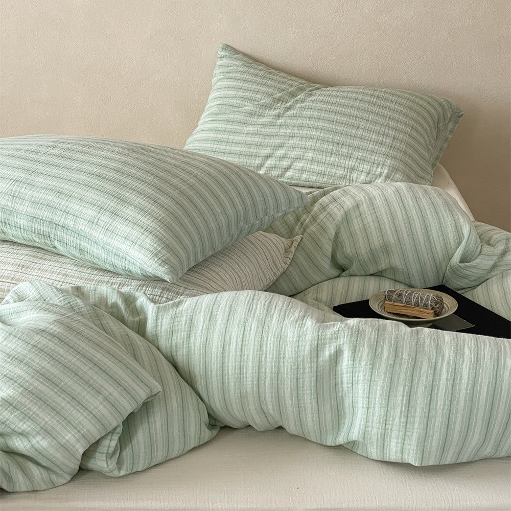 Lightweight muslin bedding set in linen look with fine stripe relief