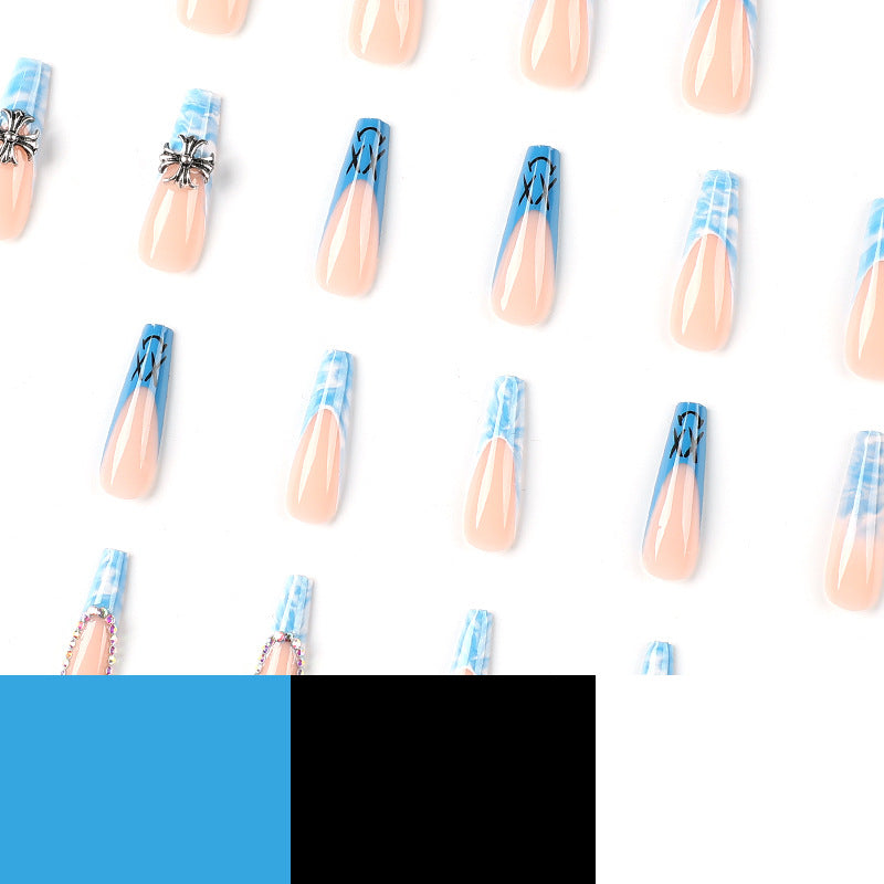 Artistic acrylic nails with marbled design and unique embellishments Stornfield