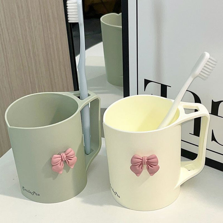 Ceramic mug with elegant bow motif Stornfield