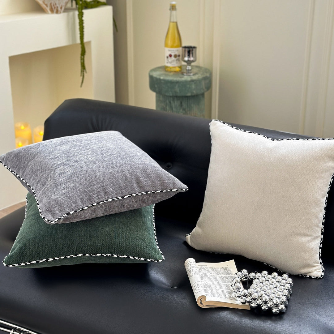 Decorative square decorative pillow made of soft velvet with contrasting piping