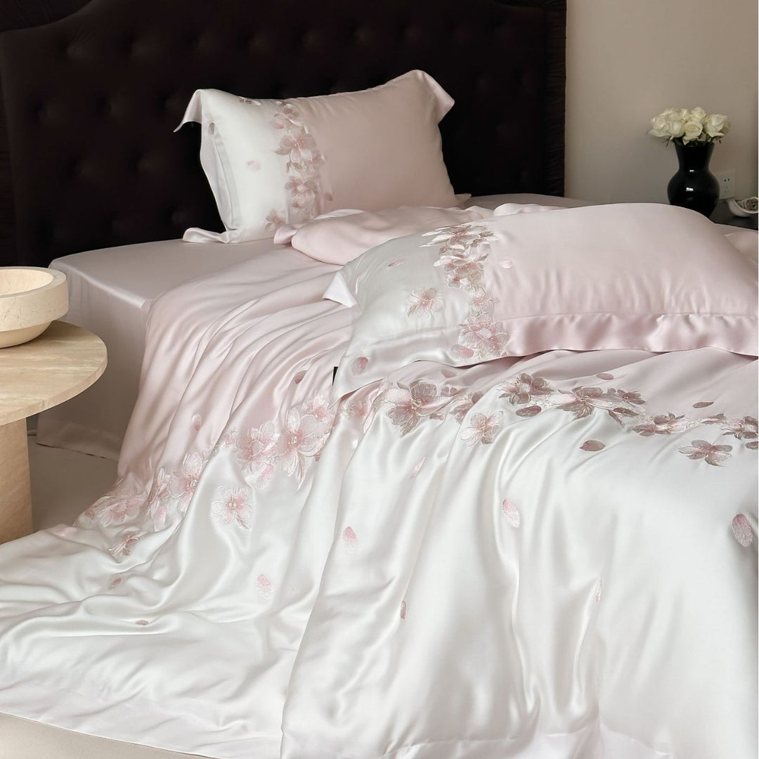 Luxurious satin bedding set with floral embroidery border and silky shine surface
