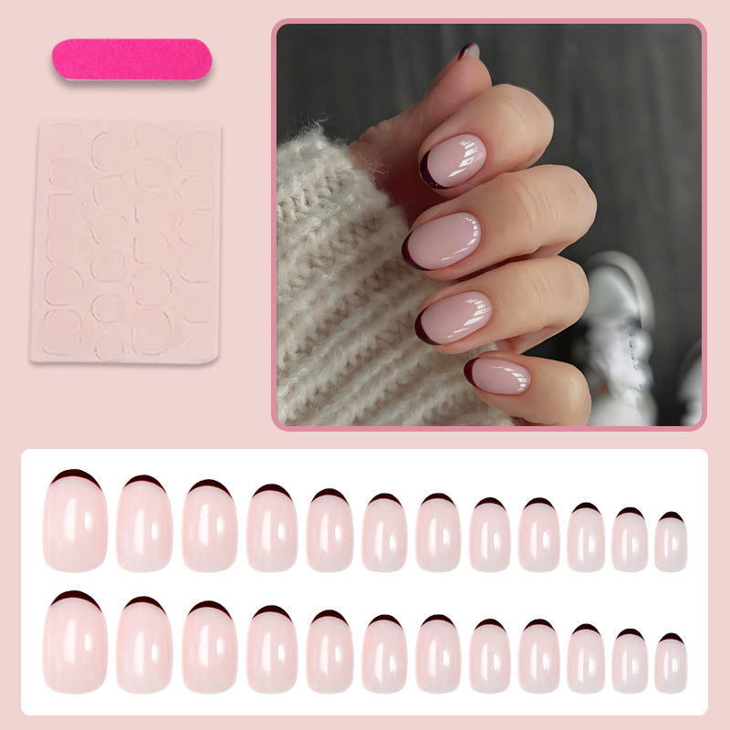 Artificial nail set with elegant French tips and trendy design Stornfield