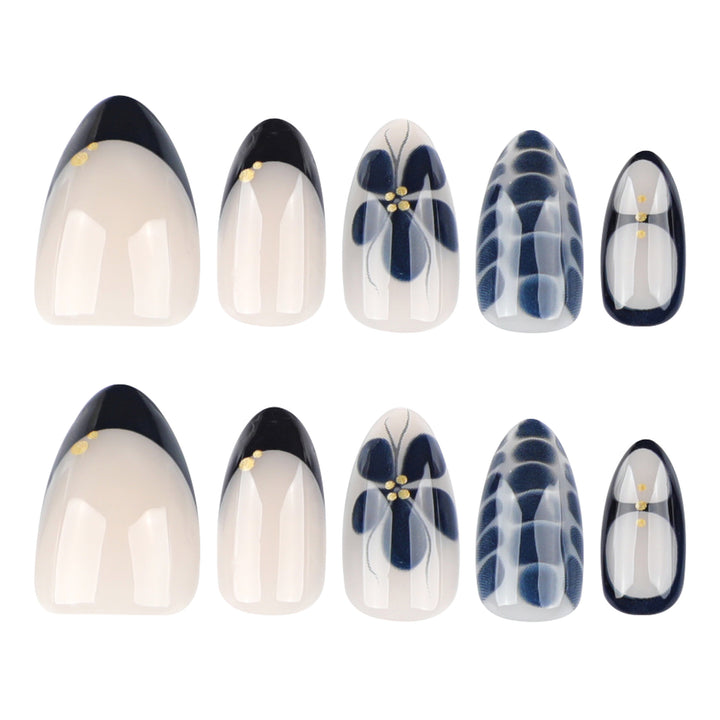 Artful nail art in elegant stiletto design with floral accents Stornfield