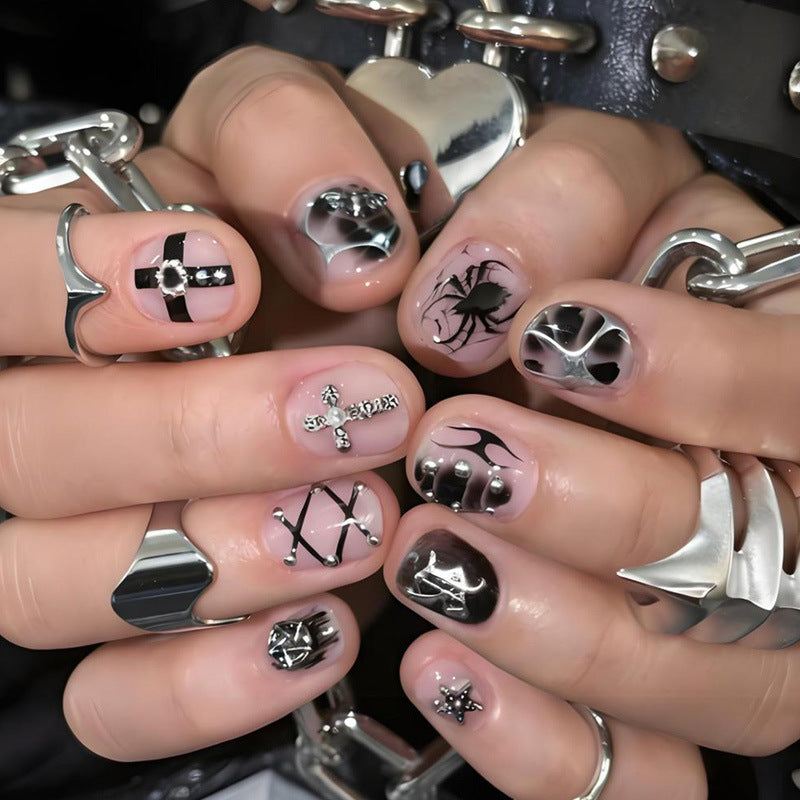 Nail art set with creative Halloween motifs and glamorous accents Stornfield