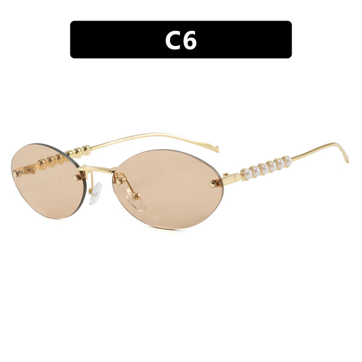 Women's stylish oval sunglasses with elegant embellishments Stornfield