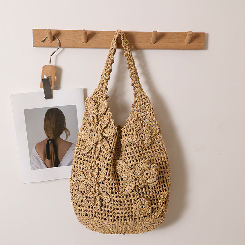 Crocheted shoulder bag with floral appliqués Stornfield