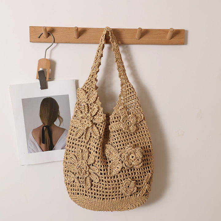 Crocheted shoulder bag with floral appliqués Stornfield