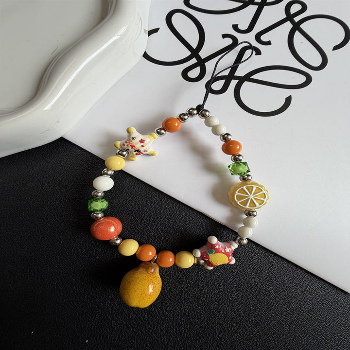 Playful Pearl and Charm Exaggerated Necklace Stornfield