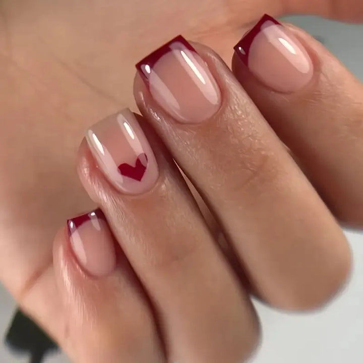 Elegant Heart-Embellished Nail Art Design Stornfield