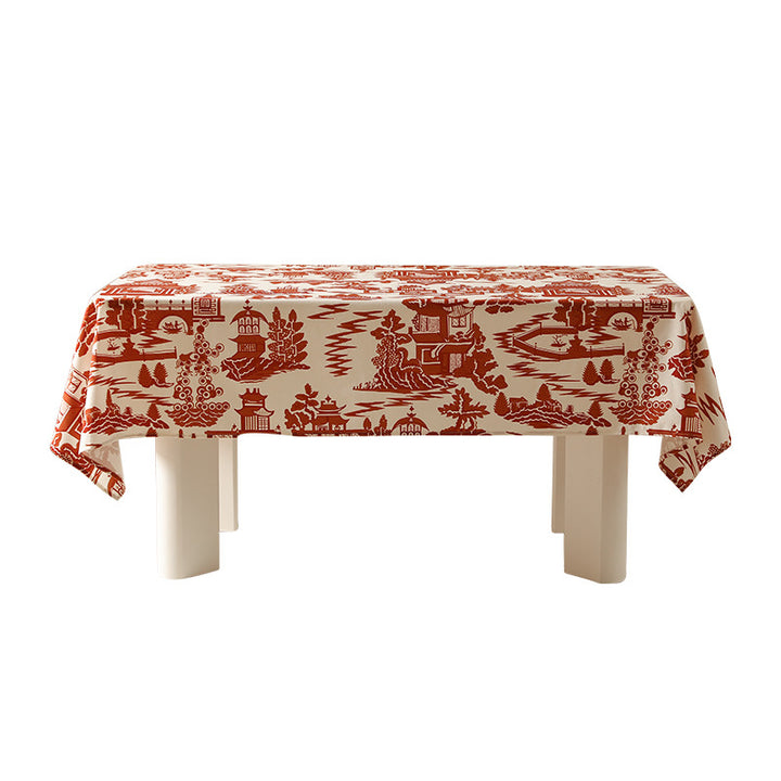 Checked flannel tablecloth with pom-pom tassels and traditional tartan pattern