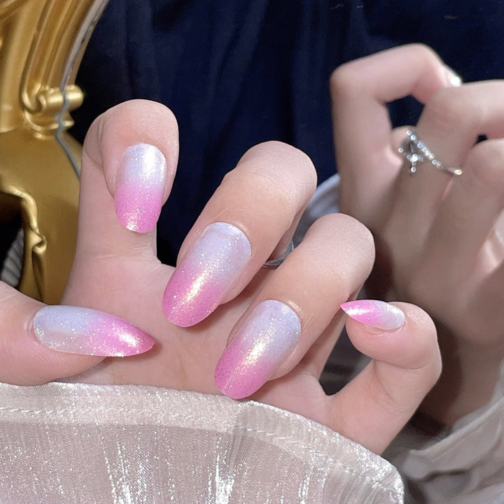 Artificial nails with glitter gradient and ombre effect Stornfield