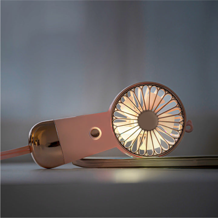 Ladies portable hand fan with USB charging function and ergonomic handle Stornfield