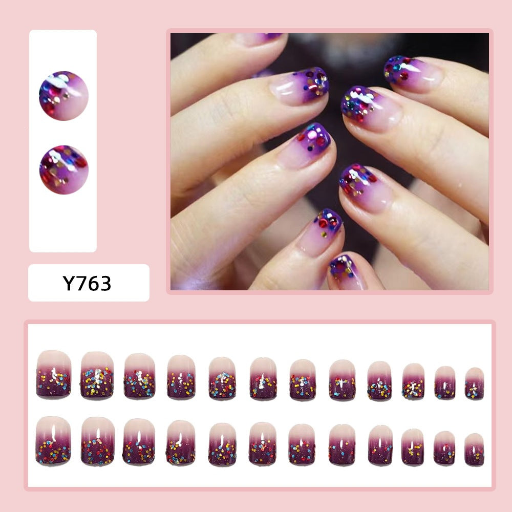 False nails with glamorous glitter design Stornfield