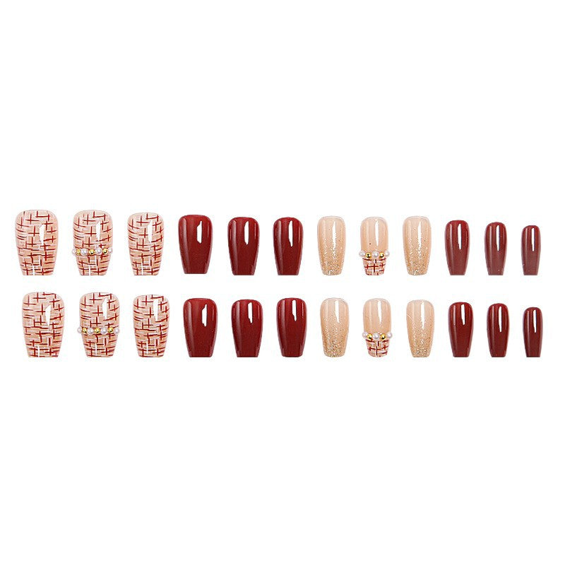 Artificial nail set with glamorous glitter and textural accents Stornfield