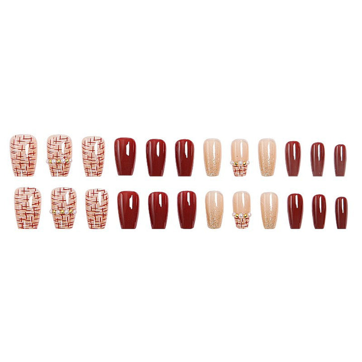Artificial nail set with glamorous glitter and textural accents Stornfield