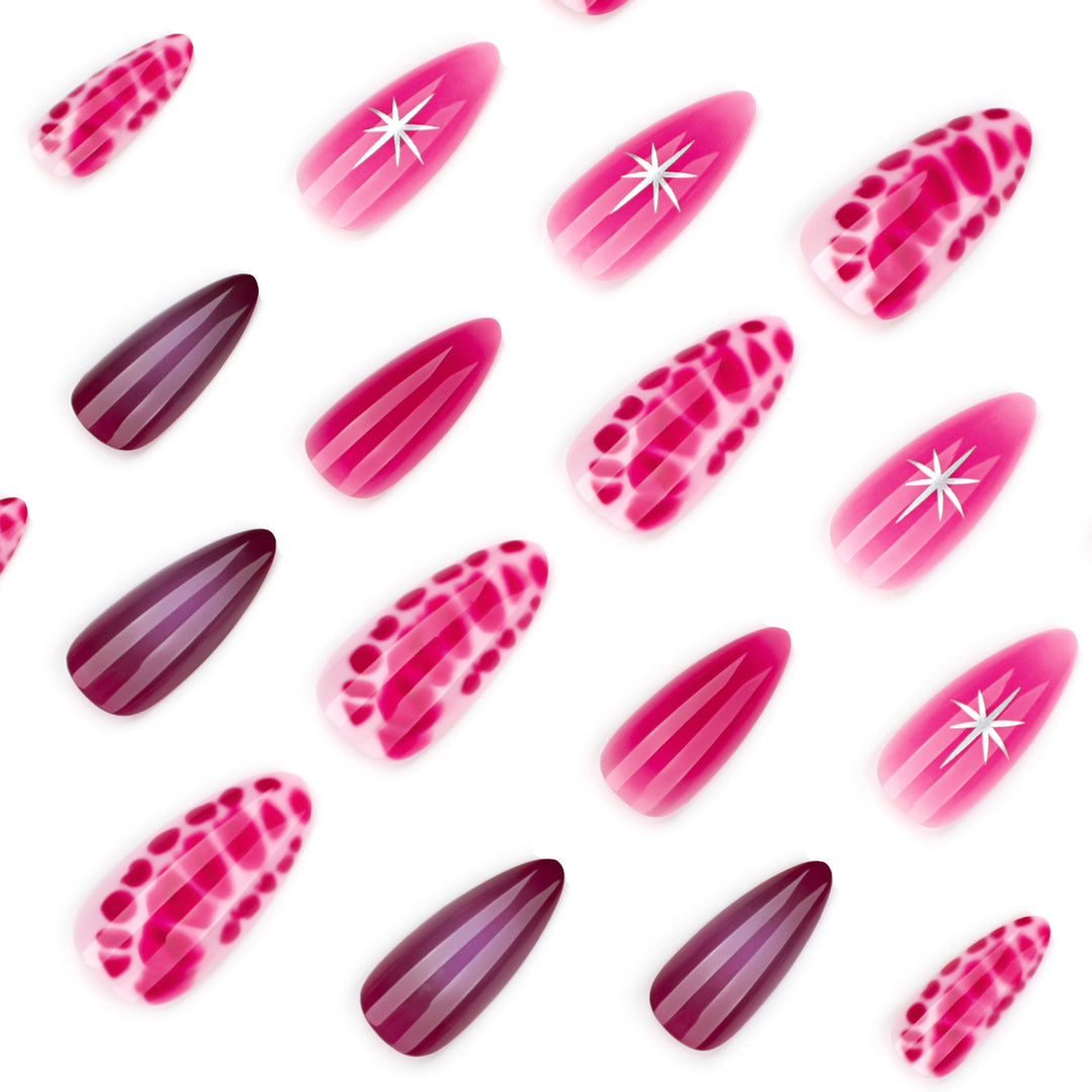Artistic stiletto nails with elegant gradient and delicate accents Stornfield
