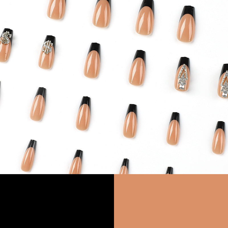 Glamorous artificial nails with rhinestones and black tips Stornfield
