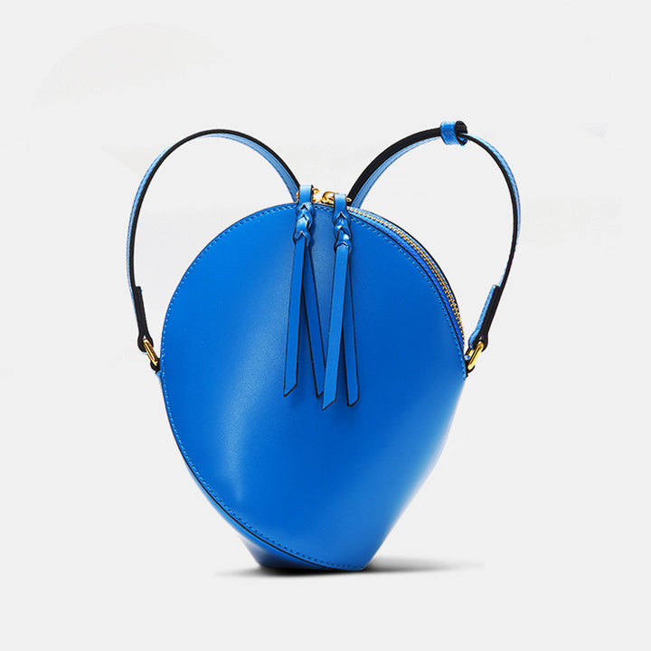 Sculptural Teardrop Crossbody Bag with Adjustable Strap & Tassel Zip