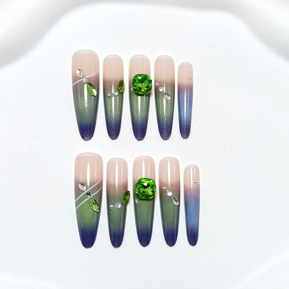 Artifical nails with elegant ombre design and sparkling accents Stornfield